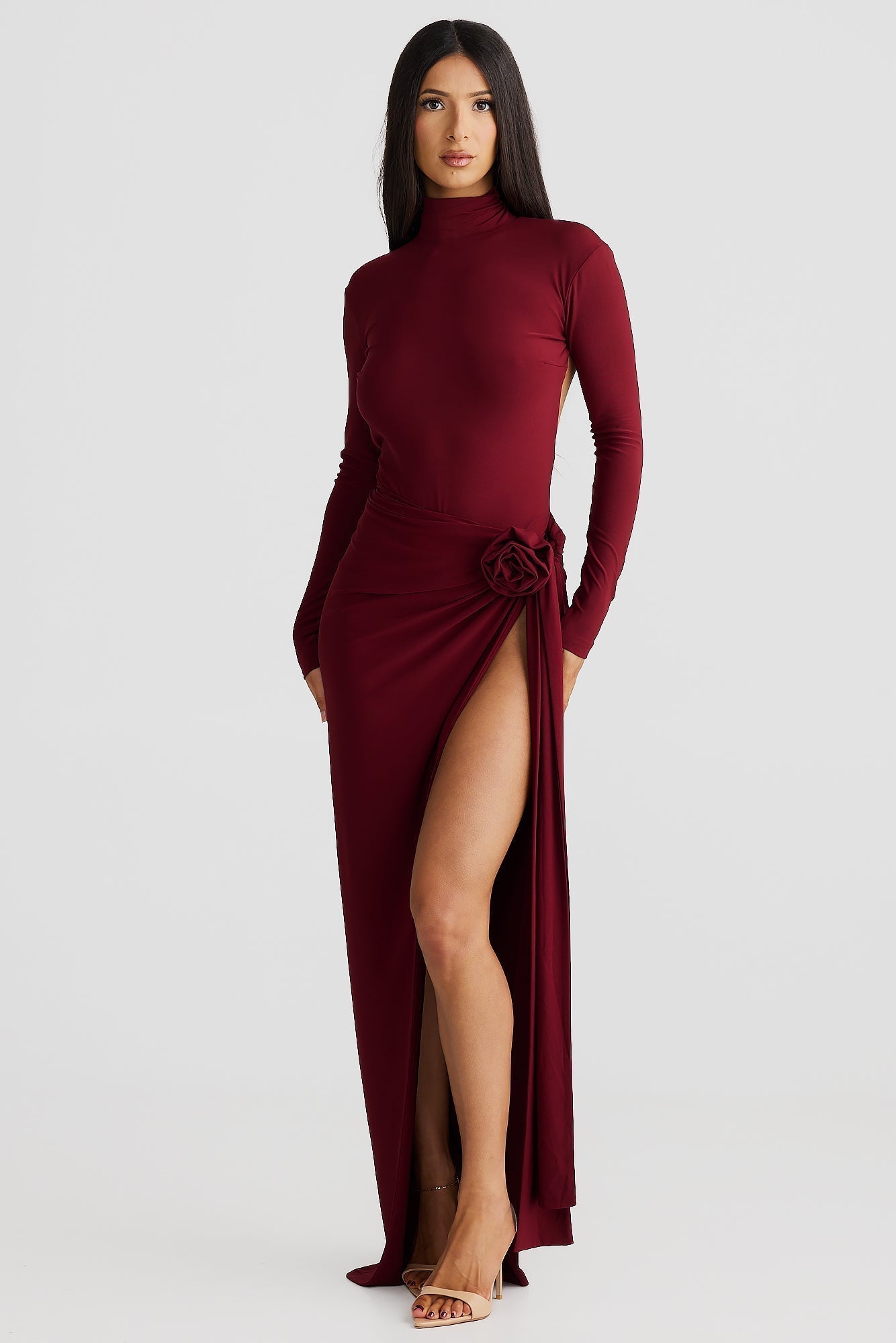 "Lira Öppen Rygg Klänning" could be rewritten as "Lira Klänning med Öppen Rygg".