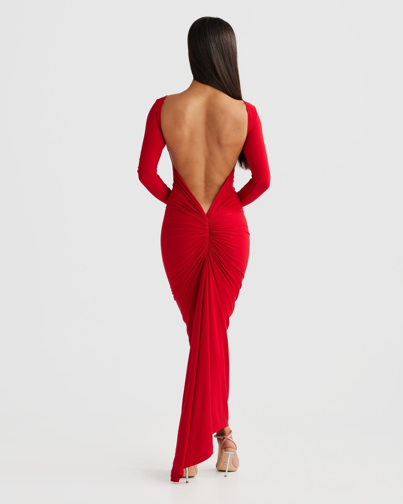 "Camily Öppen Rygg Klänning" can be rewritten as "Camily Klänning med Öppen Rygg".